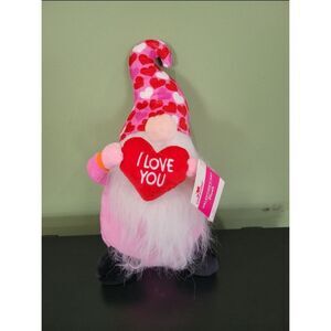 Valentines' day pink, red love heart holding gnome